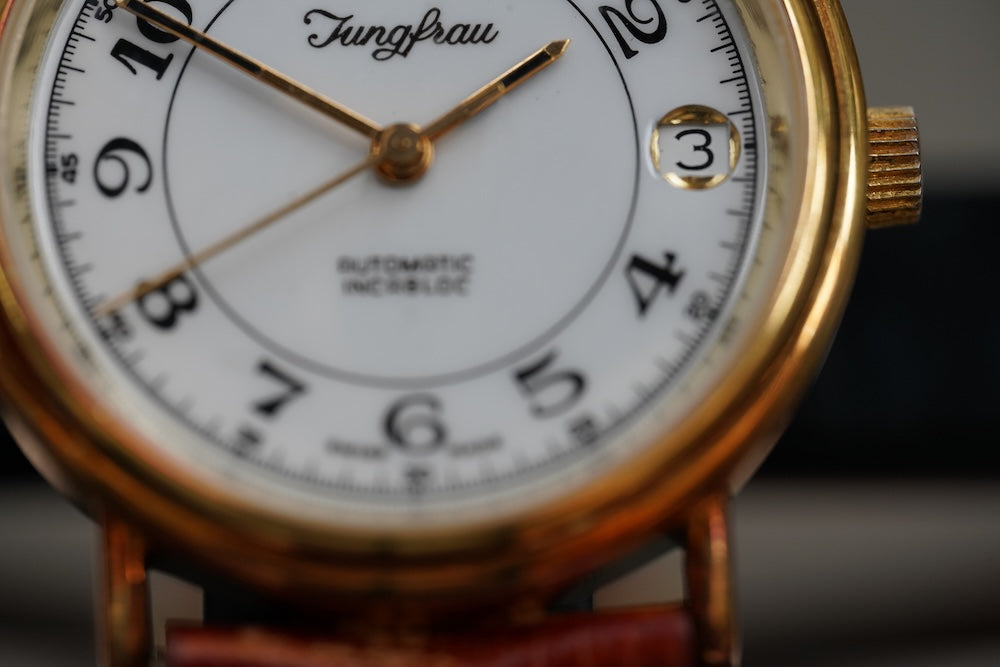 Guilded Junfrau microrotor automatic, date
