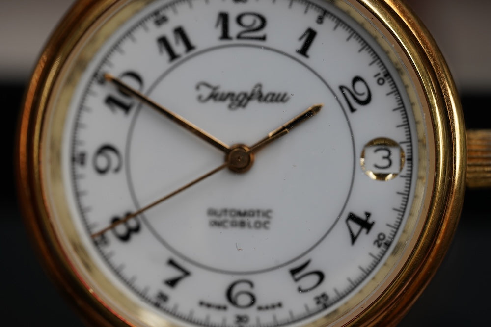 Guilded Junfrau microrotor automatic, date