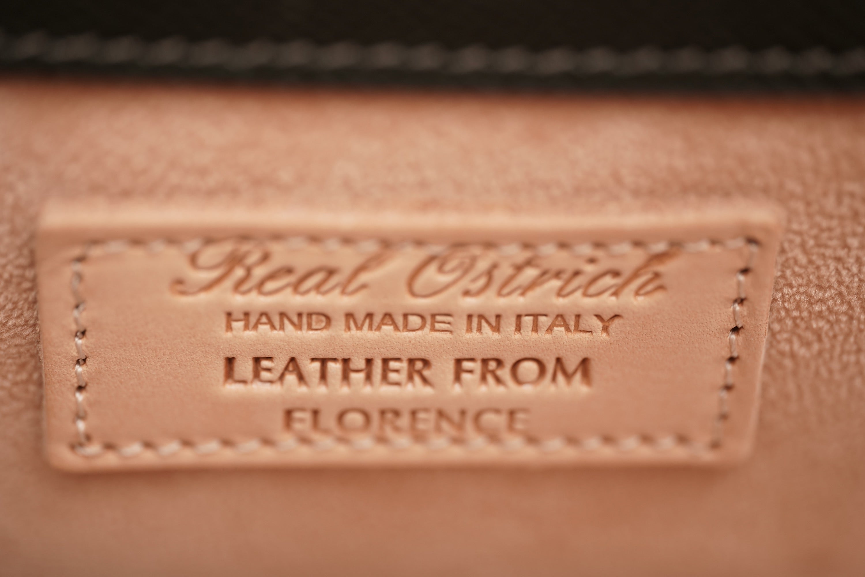 Warm greystone A4+ business bag in ostrich leather