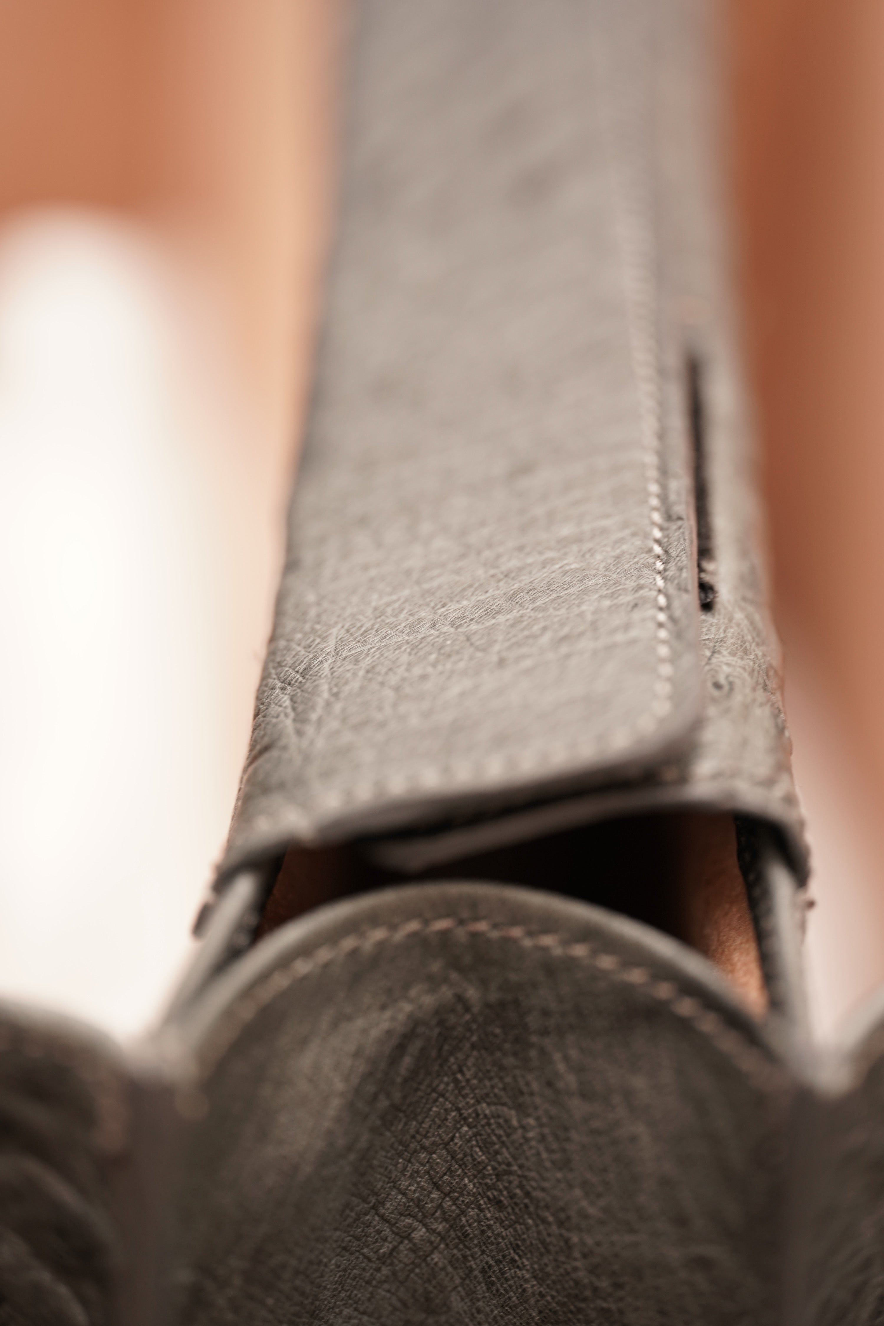 Warm greystone A4+ business bag in ostrich leather