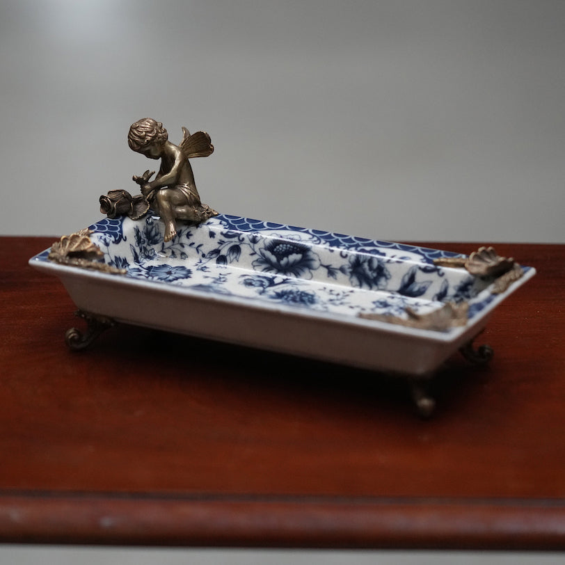 Classical porcelain ashtray with bronze feet and decoration